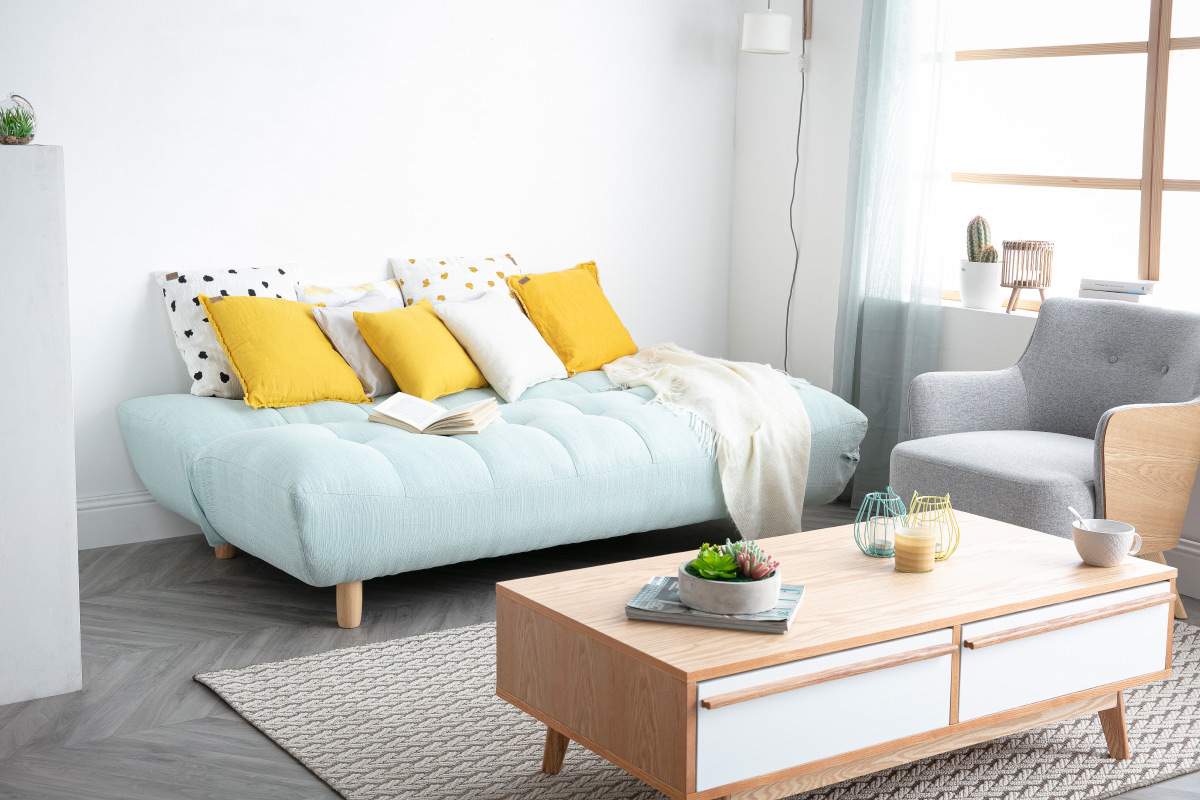 Canap� convertible scandinave en tissu menthe � l'eau et bois clair YUMI