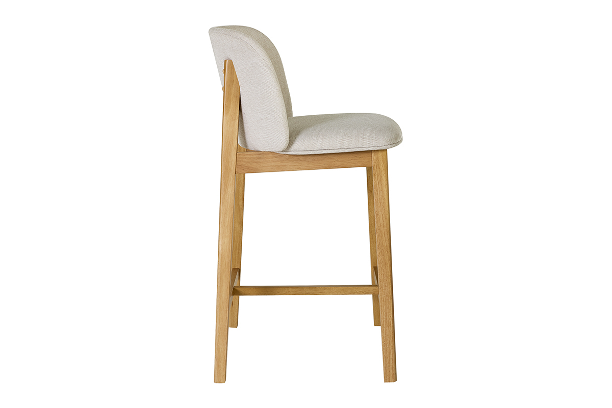 Tabouret de bar en tissu beige et bois clair, vue de profil.